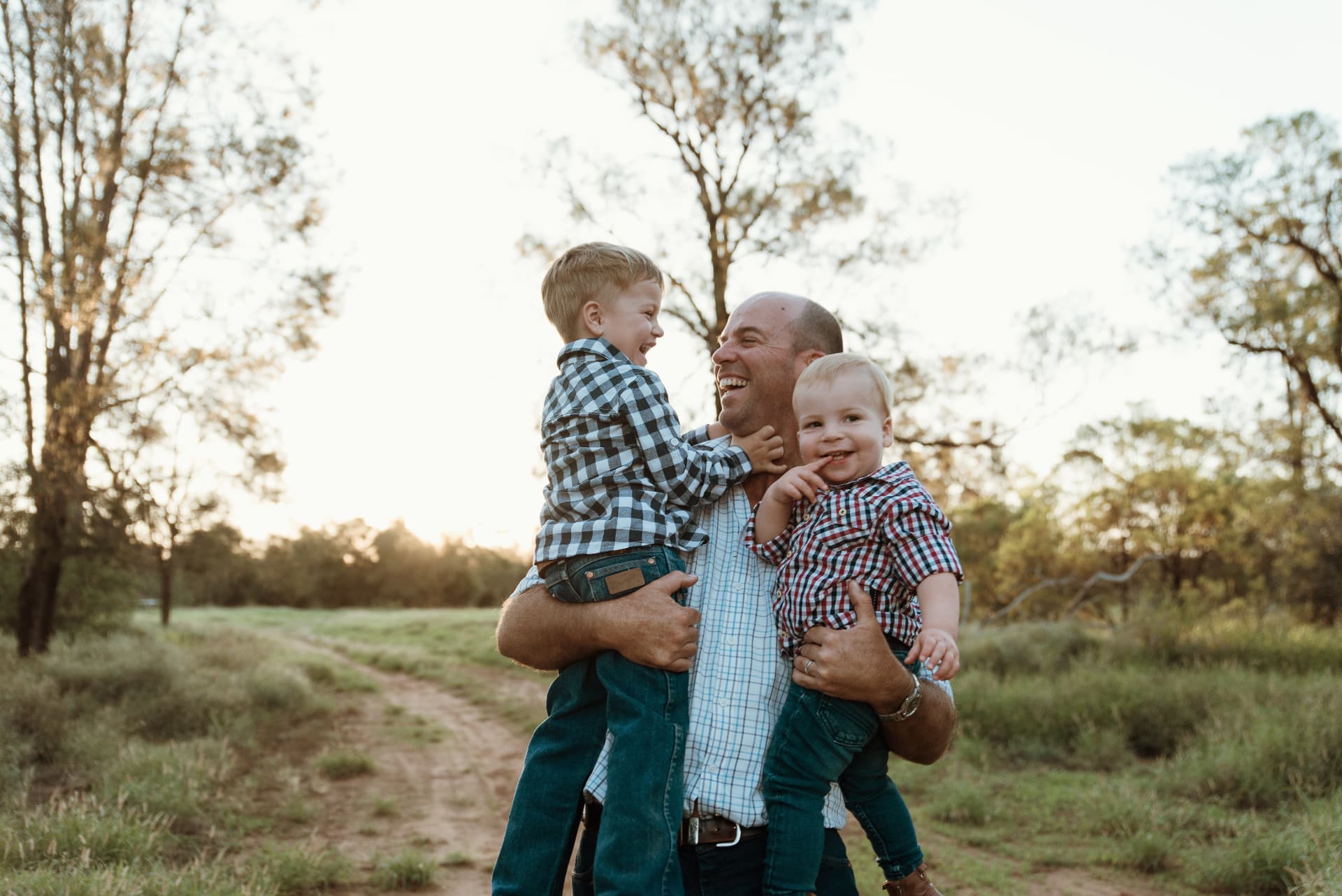 Father Land podcast artwork showing rural Australian landscape